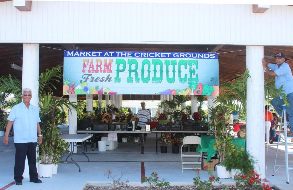 Cayman Farmers' Market sign - with Hamlin Stephenson